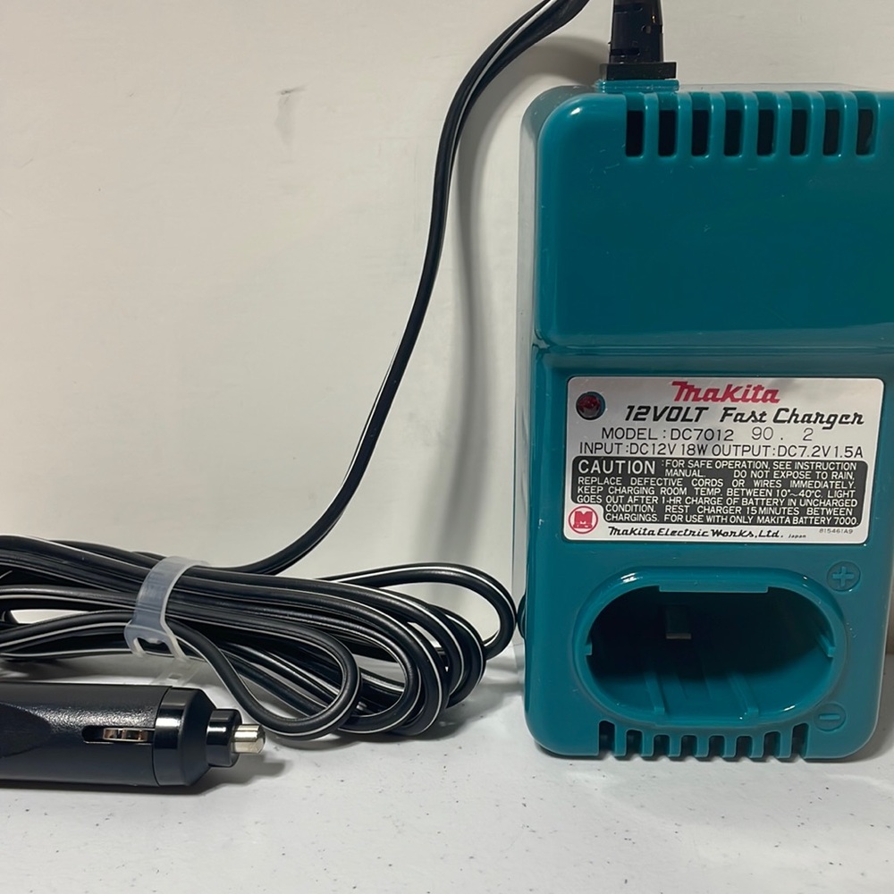 Makita Fast Charger Model DC7012. Connects to car port